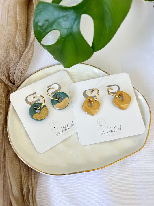 Gold trimmed mini hoops